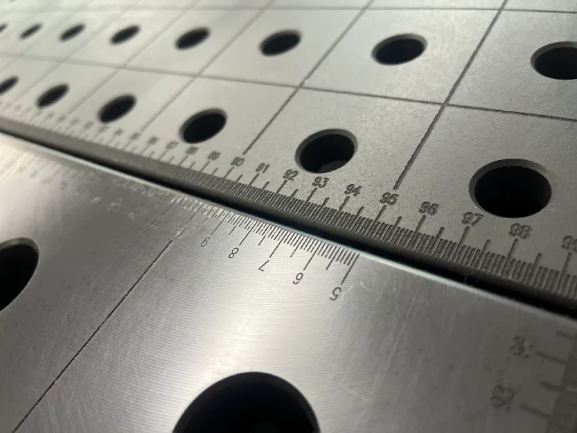 Cast iron welding table on top. Steel welding table on the bottom